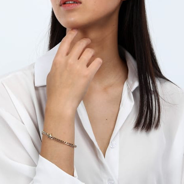 Woman wearing LA PETITE STORY JEWELRY Mod. LPS05ARR77 bracelet with elegant style.