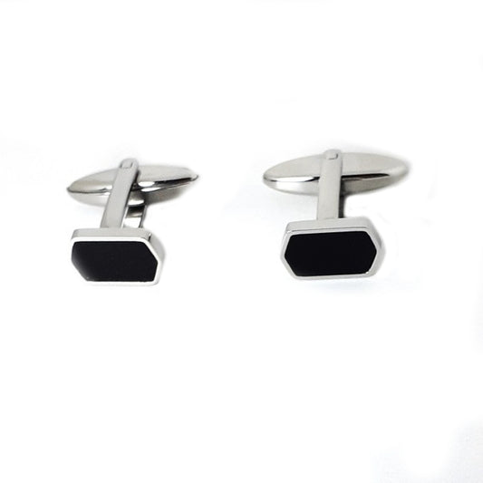 Elegant silver cufflinks with black hexagonal design, perfect for formal occasions and adding a touch of sophistication to any outfit.