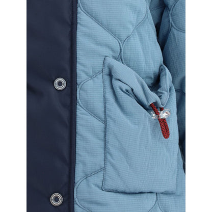 Close-up of MARBELL Light Blue Polyamide Coat with double-breasted closure, quilting, and contrasting shoulder detail.
