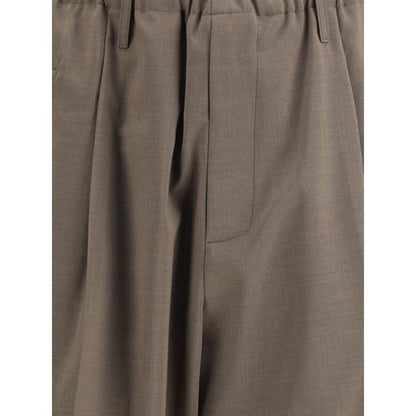 Close-up of Magliano Brown Polyester Casual Pants, showcasing elastic waistband and pocket details in a relaxed, contemporary style.