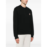 Maison Kitsuné Maison Kitsune speedy fox patch comfort sweatshirt in black, ribbed cuffs and hem, French terry lining, modeled in size M.