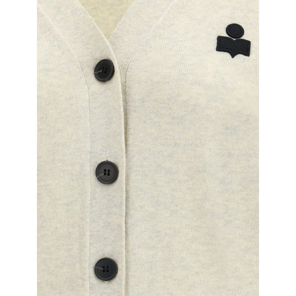 Close-up of Marant Etoile White Cotton Cardigan with front button closure and logo, showing V-neckline and texture.