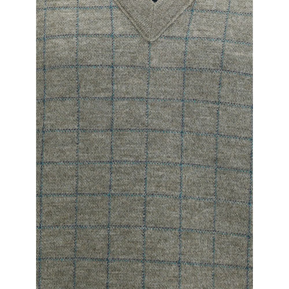 Margiela Green Fleece Wool Sweatshirt with grid pattern and V-neckline, essential winter wear from Maison Margiela, composed of 100% fleece wool.