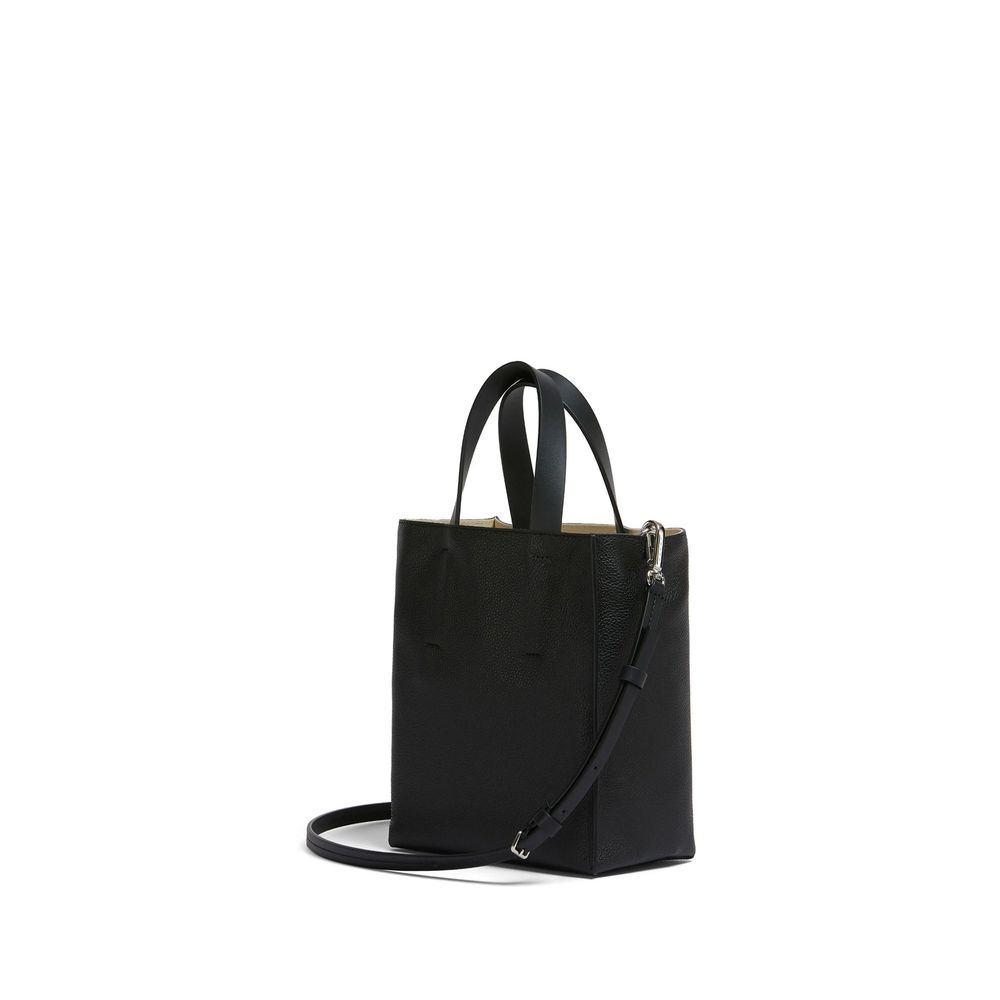 Front view with bag zipped and handles upright.