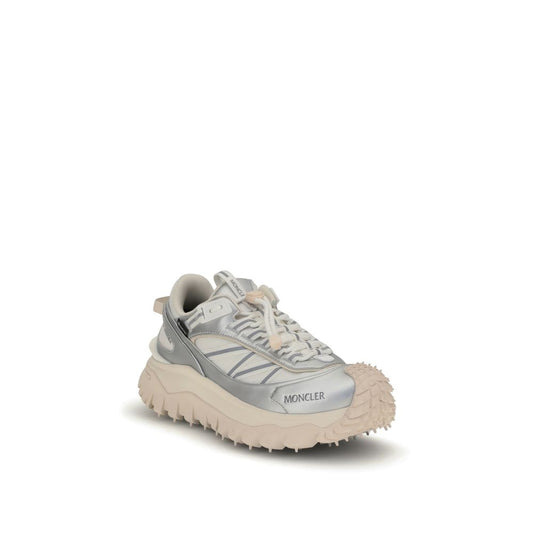 Moncler Trailgrip GTX low-top Sneakers with reflective inserts, padded ankle, and drawstring closure for comfort and style.