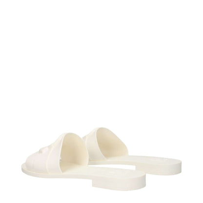 Moncler White Cotton Slippers with rubber sole and front logo, featuring open toe and low flat heel design.