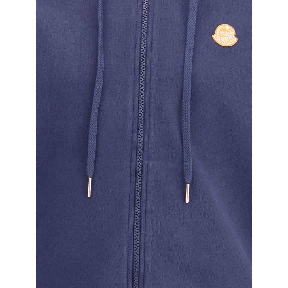 Moncler x Donald Glover Blue Cotton Sweatshirt featuring zip-front and drawstring, cotton fleece material, with Moncler Genius logo detail.