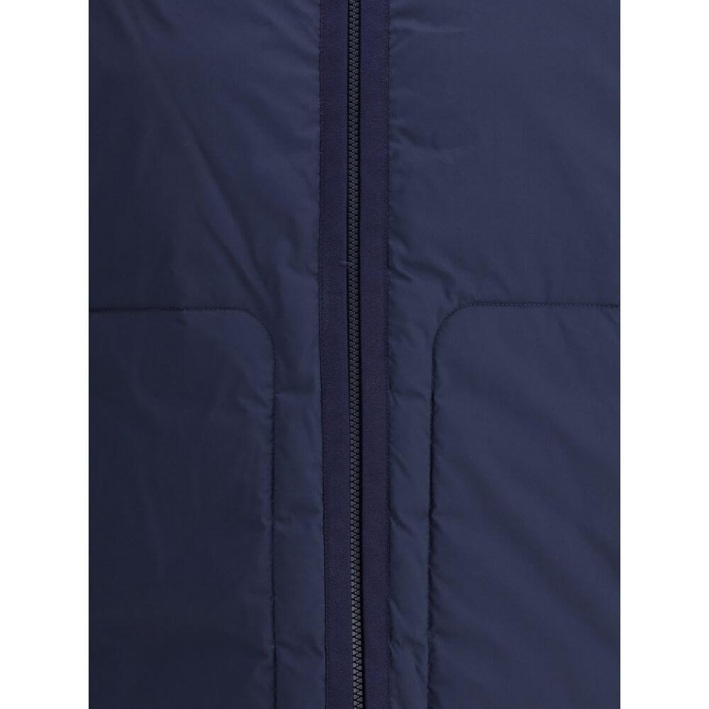 Close-up of Moncler x Donald Glover Blue Goose Down Full-Length Jacket showing zip and quilting details.