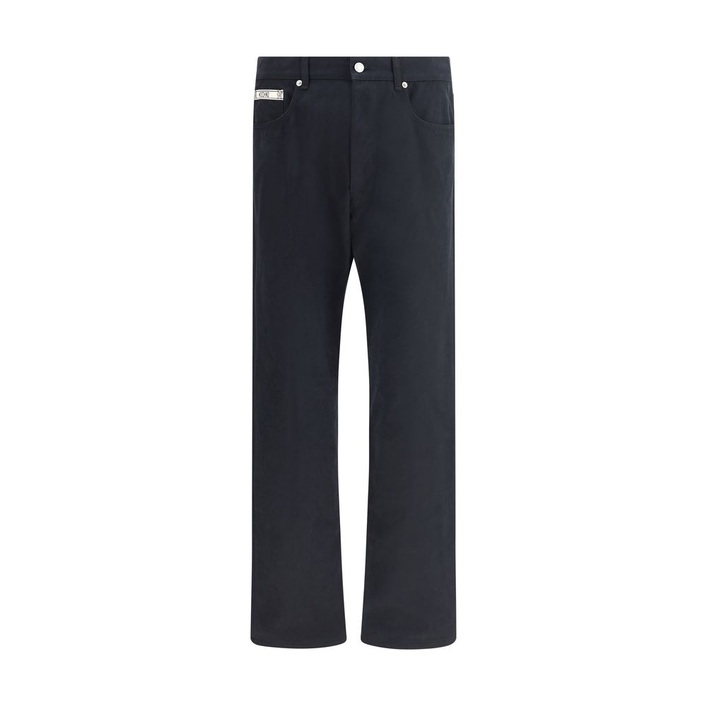 Moschino Black Cotton Casual Pants with straight-leg cut and five-pocket design, featuring brand's signature patch, made in Italy.