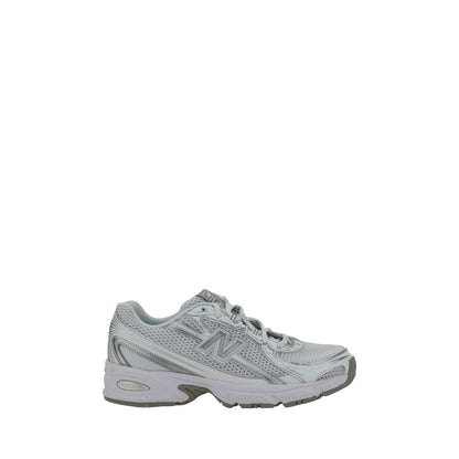 New Balance White Polyurethane Athletic Sneakers with mesh details, lace-up closure, and rubber sole, side view.