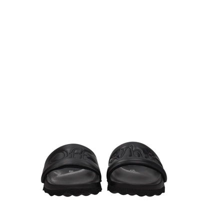 Off-White Black Leather Slippers front view showcasing open toe design with logo, flat rubber sole, and casual style.