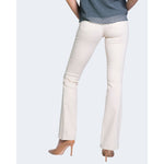 Woman wearing Only Cream Cotton Bootcut Jean showcasing flared design and comfortable fit, perfect for versatile outfits.