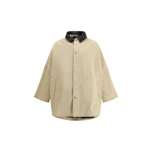PDF Channel Oversized cotton Jacket with front button closure, denim collar, and asymmetrical hem, featuring a contemporary design.