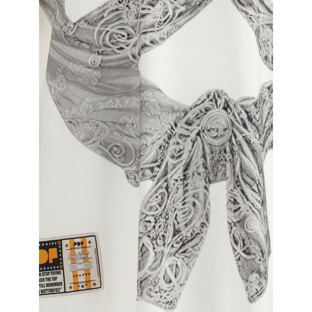 Close-up of PDF Channel The Boy White Flake T-Shirt showing graphic embossed design and fabric details.