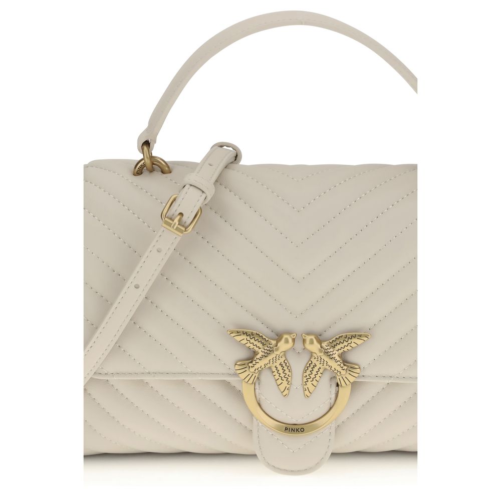 Front view with bag zipped and handles upright.