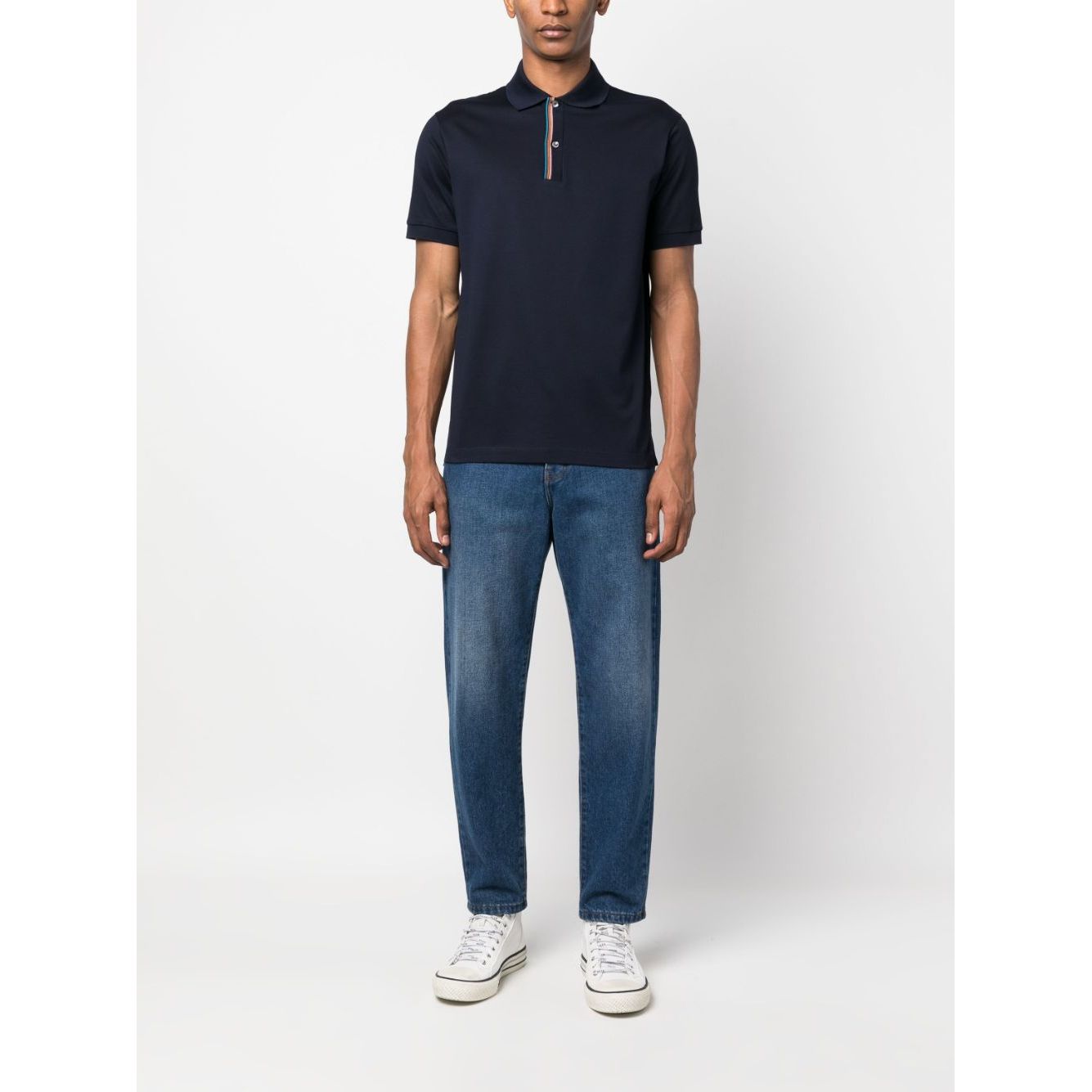 Model wearing PS By Paul Smith T-shirts and Polos Blue with rainbow stripe detail, navy cotton polo shirt, front button placket.