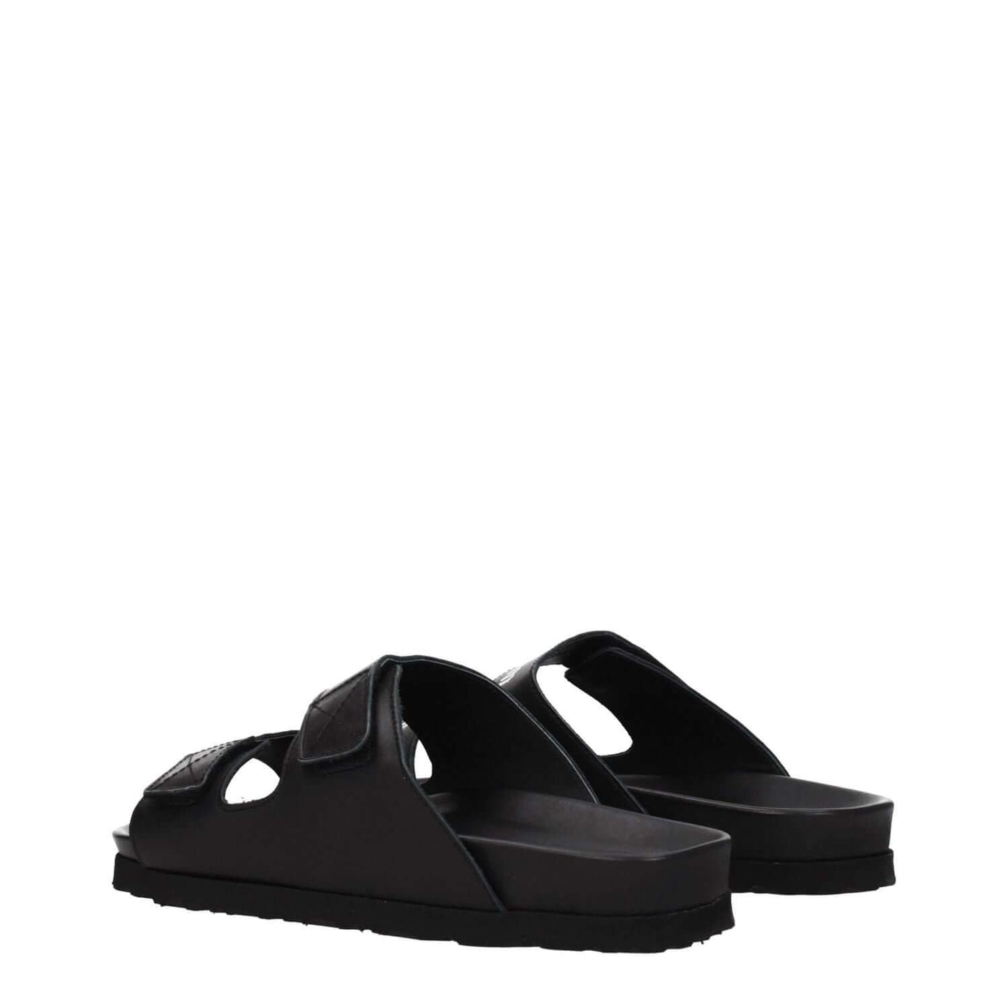 Palm Angels Black Leather Slippers with strap closure, rubber sole, open toe, low flat heel, and front logo.