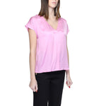 Woman wearing Rinascimento Multicolor Viscose Blouse, short sleeve, 100% viscose, part of women's clothing collection.