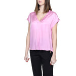 Woman wearing Rinascimento Multicolor Viscose Blouse with short sleeves in pink, showcasing stylish design and 100% viscose composition.