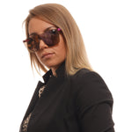 Woman wearing sunglasses, modeling SUPERDRY MOD. SDS SUPERSYNTH 14172, unisex product