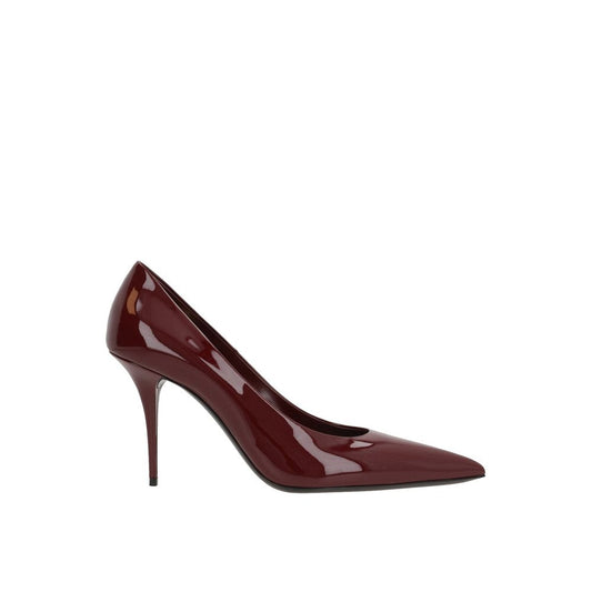 Saint Laurent Red Calfskin Platform Pumps with patent effect, pointed toe, slip-on design, leather composition, 9cm heel.