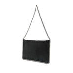 Black Stella McCartney Falabella clutch with chain-link strap and whipstitch trim in faux suede, featuring braided trim and protective dust bag.