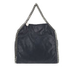 Stella McCartney Falabella mini handbag with chain-link trim and top handles, blue black color, showcasing stylish design.