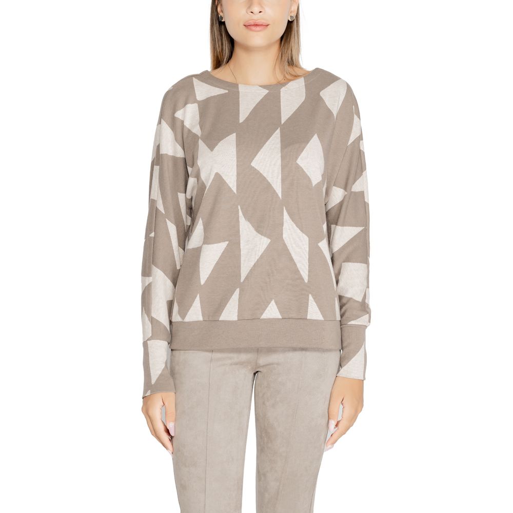 Model wearing Street One Brown Polyester Sweatshirt with geometric print and classic crew neckline.