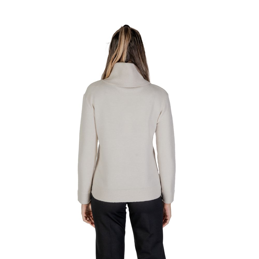 Back view of Street One Cream Viscose Turtleneck with high neck and long sleeves, showcasing modern side button design for cool days.