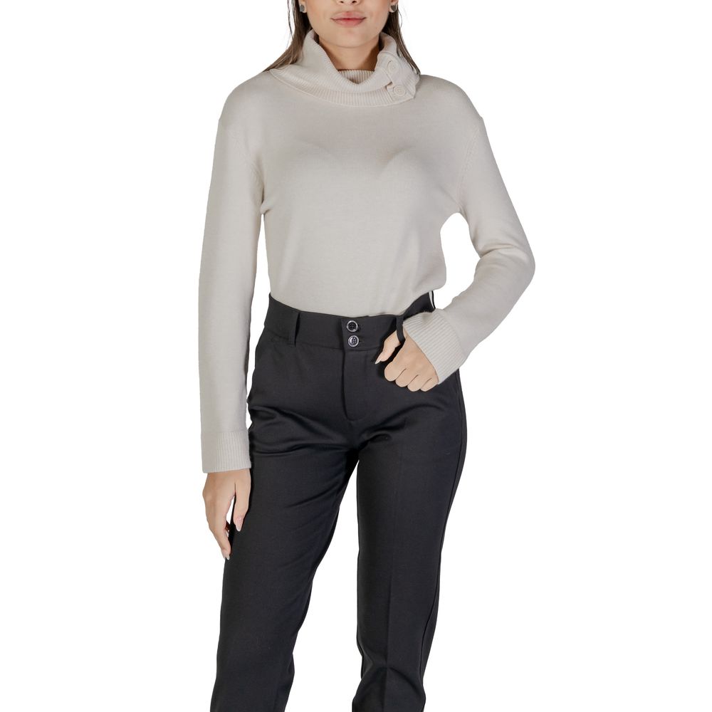 Woman wearing Street One Cream Viscose Turtleneck with side buttons, long sleeves, and high neck.