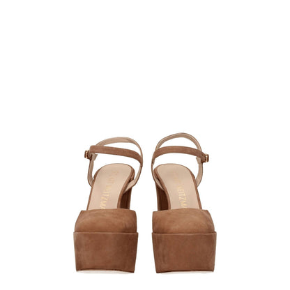 Stuart Weitzman Beige Leather Platform Sandals with buckle closure and high heel, suede material, round toe, and leather sole.
