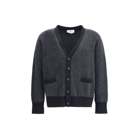 Thom Browne Black Fleece Wool Cardigan with V-neckline and front button closure, ideal for sophisticated style in AW25 collection.