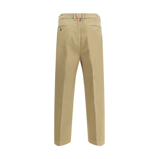 Thom Browne Cotton Pants with high waist, tricolor patch, straight-leg design, and buttoned back pockets for a refined look.