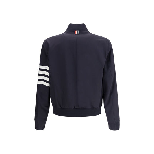 Back view of Thom Browne Wool Jacket featuring a signature horizontal band on the left arm and ribbed details.