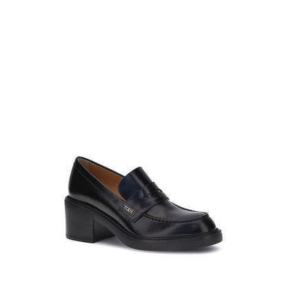 Tod's Black Calf Leather Bos Taurus Platform Loafers with chunky heel and elegant design, ideal for casual and formal looks.