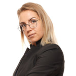 Person wearing Tommy Hilfiger Black Unisex Glasses Frame with metal & plastic construction, square style, and full-rim design.