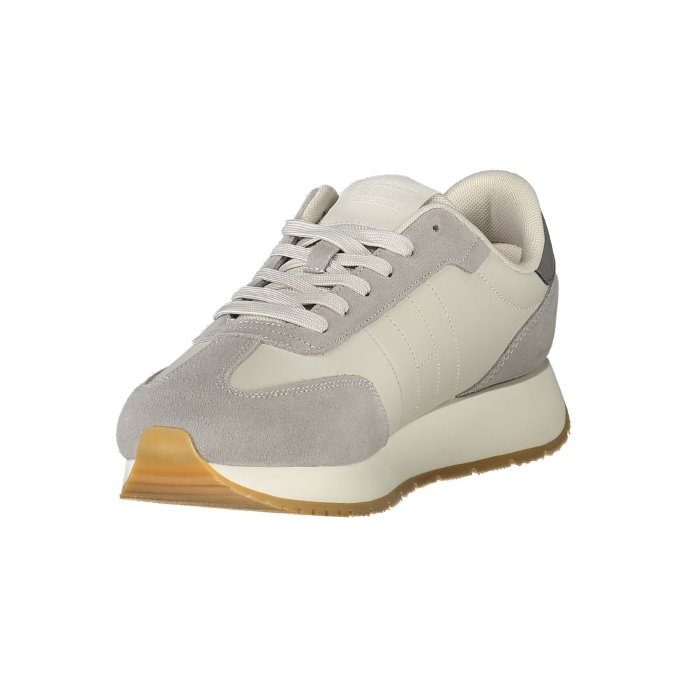 Tommy Hilfiger Brown Leather Men Sneaker with dynamic textures and contrasting details for trendsetting fashion.