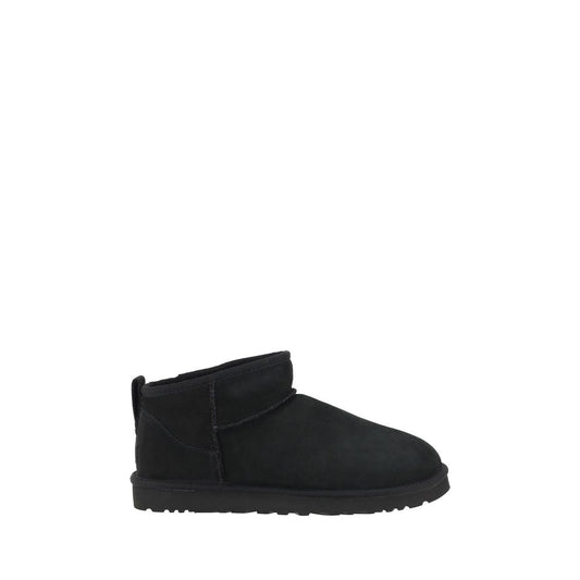 UGG Black Goatskin Ankle Boots with shearling lining and knurled sole for grip, featuring iconic monogram and suede design.