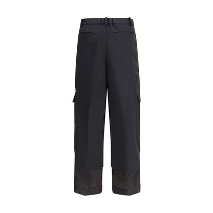 Undercover Black Polyester Cargo Pants with wide leg, side cargo pockets, hook-and-zip closure, and paneled design for AW25 Season.