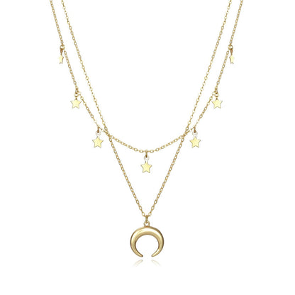 Gold layered necklace with star and moon pendants, perfect women's jewelry accessory for stylish outfits and special occasions.