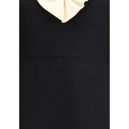 Valentino Black Fleece Wool Cocktail Dress with voile detail and deep V-neckline, featuring elegant silk and wool blend.