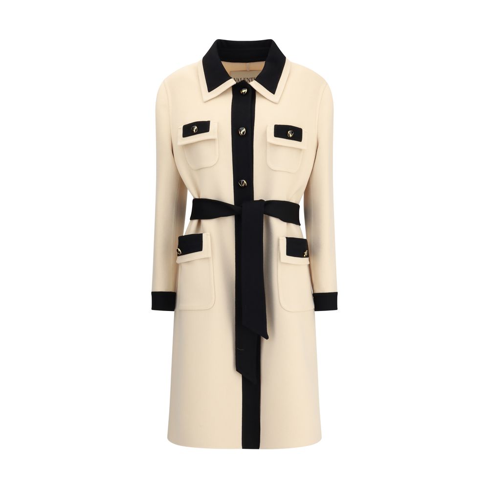 Valentino Cream Fleece Wool Coat with black fabric belt, contrasting collar, and decorative pockets for a refined silhouette.