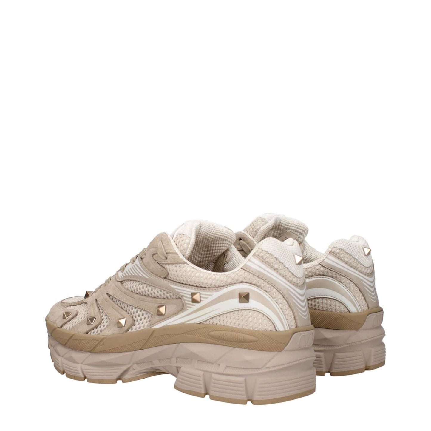 Valentino Garavani Beige Fabric Low Top Sneakers with studs, lace-up closure, and mid heels, featuring front and back logos.