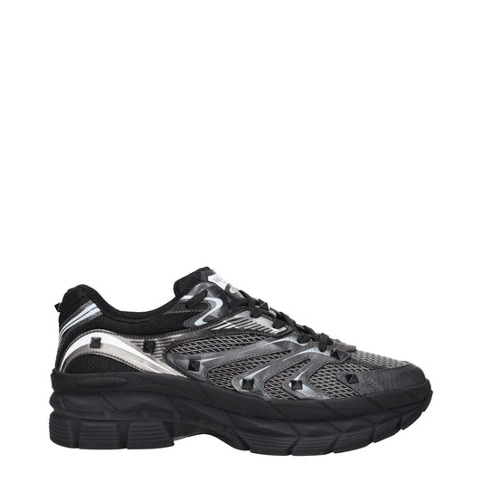 Valentino Garavani Black Fabric Athletic Sneakers with studs and logo, lace-up, leather material, rubber sole, round toe.