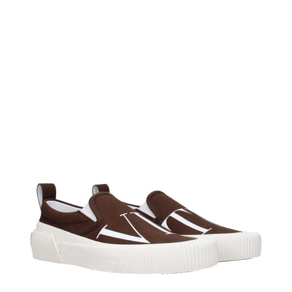 Valentino Garavani Brown Fabric Slip-On Loafers with logos, round toe, and rubber sole, casual style, dark chocolate accents.