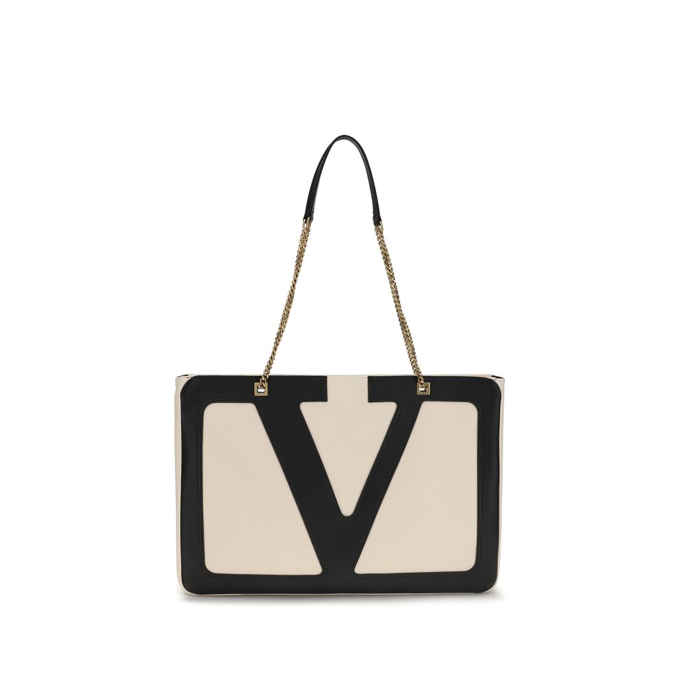 Valentino Garavani Cream Lamb Ovis Aries Aries Shoulder Bag with Signature VLogo and sliding chain. Elegant design with antiqued gold finish.