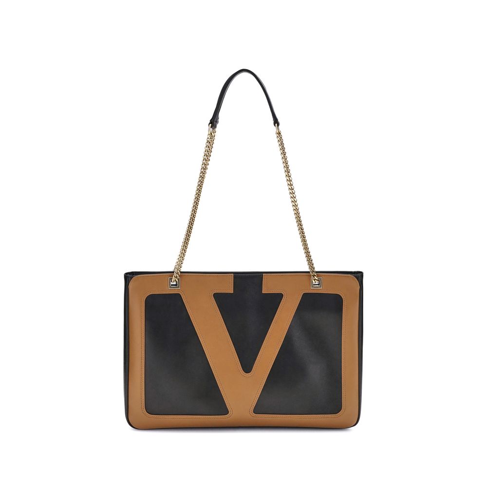 Front view with bag zipped and handles upright.