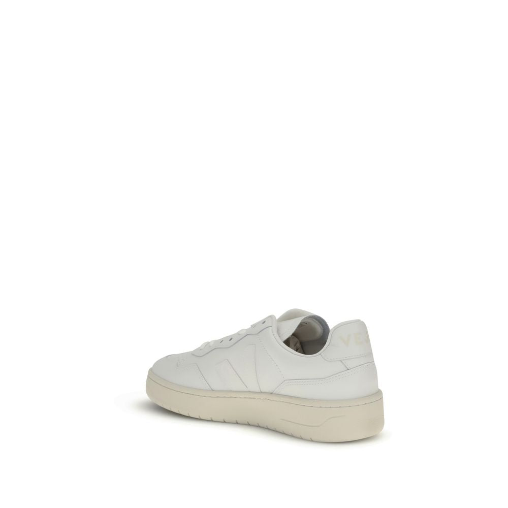 Veja White Leather Low Top Sneakers showing side and back view with iconic V logo patch and minimalist design.