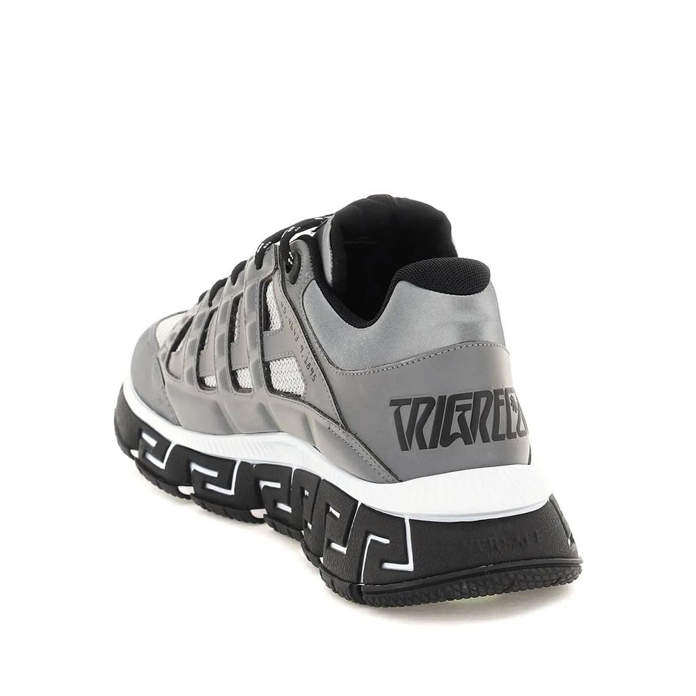 Versace Trigreca Sneaker featuring leather details, rubber sole, and logo design, made in Italy.