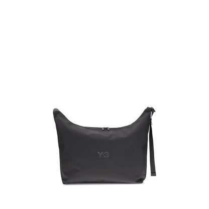 Y-3 Black Polyamide Shoulder Bag with adjustable strap and zip closure, featuring logo print for a minimal style, made in Vietnam.